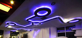 Neon lighting on the ceiling.