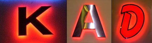 Large letters illuminated from both the front and the back.